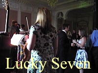 Dancing Lucky Seven at a wedding ceilidh.